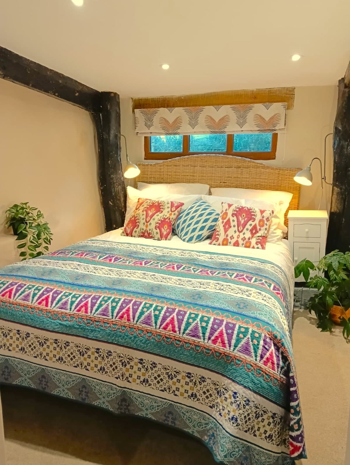 Peaceful king bedroom — bright, airy, and full of charm.